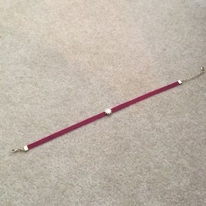 Choker maroon with a sun/star bead